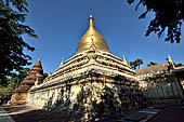 Bagan Myanmar. Next to the Gubyaukgyi stands the gilded Myazedi or 'Emerald Stupa'. 